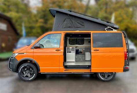 Rebellion VW Transporter Campervan Conversion Orange Swamper | Caravan Tech