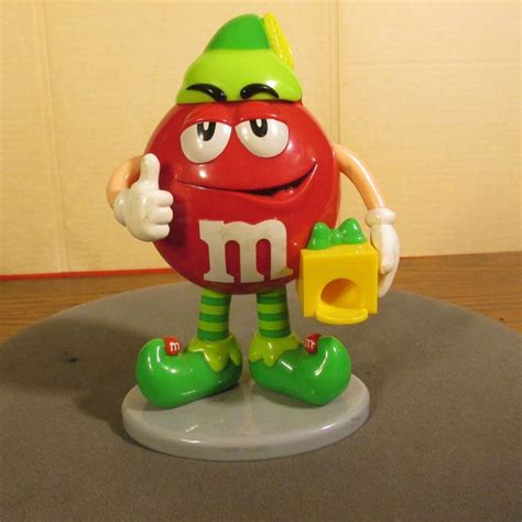 M&M Candy Dispenser HOLIDAY PACKAGE ELF | Candy dispenser, Holiday packaging, M m candy