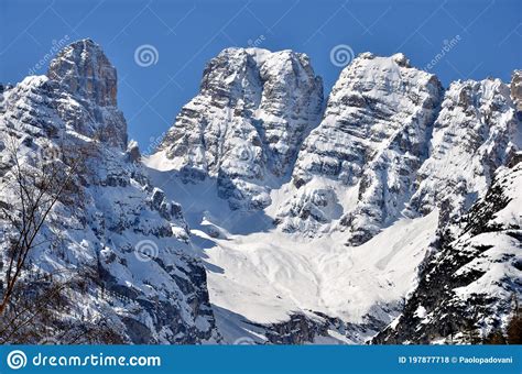 Snowy peaks stock photo. Image of sunny, blue, scenic - 197877718