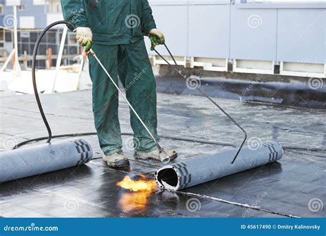 Flat Roof Covering Repair Works with Roofing Felt Stock Photo - Image of refurbishment, melt ...