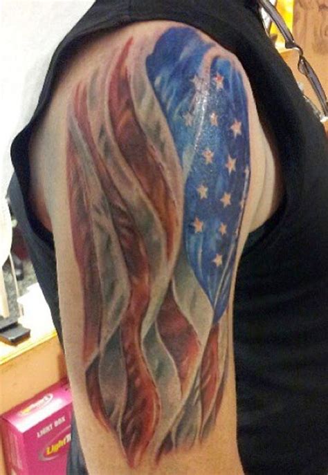 Cross with American Flag Tattoo | American flag tattoo, Flag tattoo, American flag sleeve tattoo