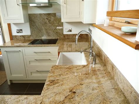 Polished Kashmir Gold Granite with cream cabinets | Granite worktops, Kashmir gold granite, Gold ...