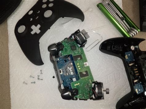 Disassembling elite series 2 controller. There was a small piece inside moving around. Was gonna ...