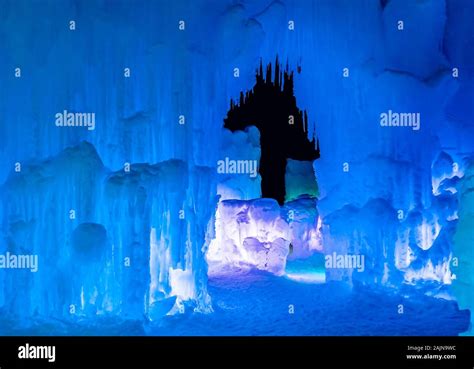 Colorful ice castle formations at night time Stock Photo - Alamy