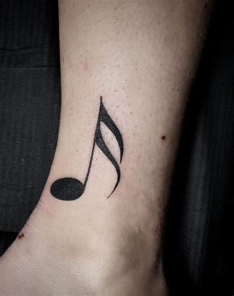 20 Amazing Musical Notes Tattoos Designs with Meanings, Ideas, and Celebrities - Body Art Guru