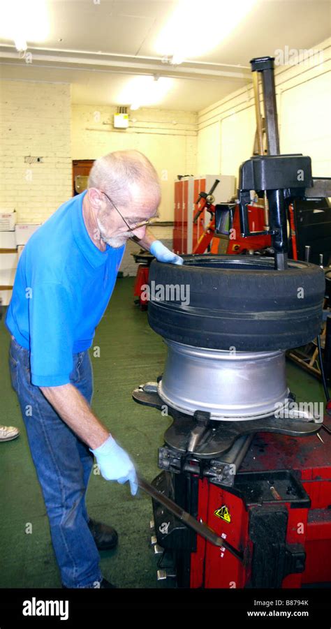 Tyre Fitter High Resolution Stock Photography and Images - Alamy