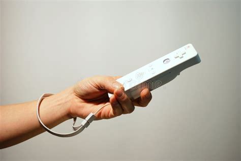 Hand Holding Wii Controller Editorial Stock Image - Image: 4053059