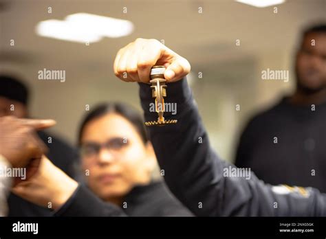 Fire Alarm training class by security guard in office Stock Photo - Alamy