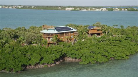 5K stock footage aerial video of a small island with a home, Summerland Key, Florida Aerial ...