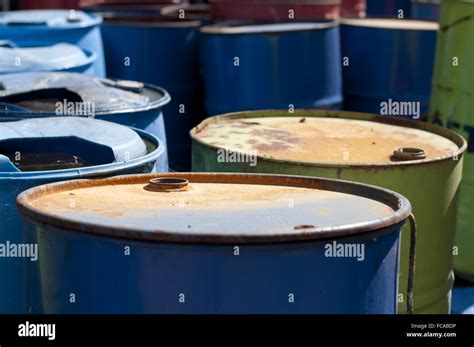 Old colored barrels for oil products Stock Photo - Alamy