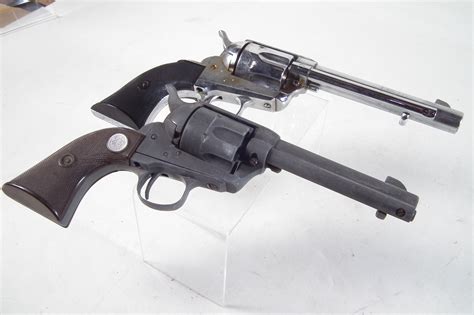 Lot 25 - Two replica Colt Single Action Army revolvers