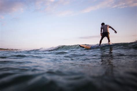 Free Images : Surfing Equipment, surfboard, stand up paddle surfing, sky, surface water sports ...