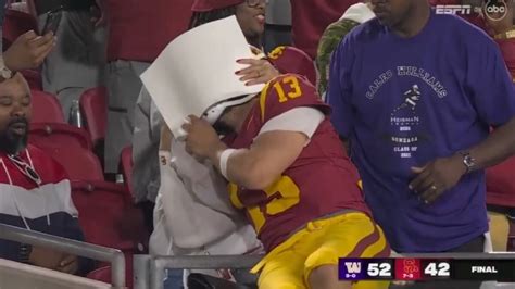 Caleb Williams Crying in his Mother's Arm Following Loss Goes Viral - TMSPN