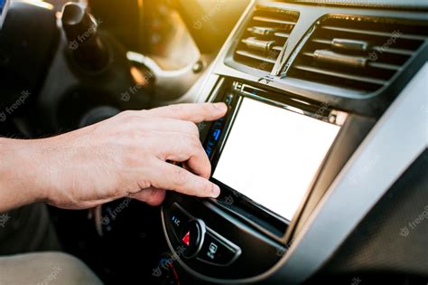 Premium Photo | Driver hands changing the radio station close up of ...