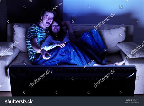 Couple On Couch Watching Tv Having Stock Photo 6746911 | Shutterstock