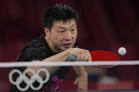 Ma Long wins 2nd Olympic gold in men's table tennis | AP News