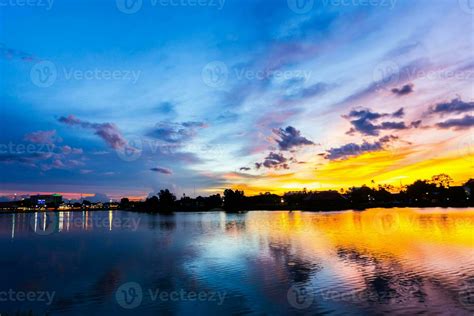 twilight sky with water reflection 27174533 Stock Photo at Vecteezy