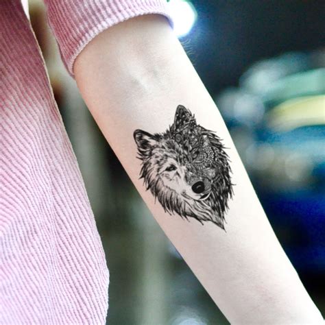 Alpha Wolf Symbol Tattoo