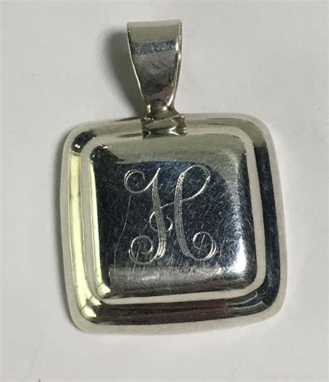 Bid Now: Sterling Silver Engraved Pendant - January 4, 0122 10:00 AM EST