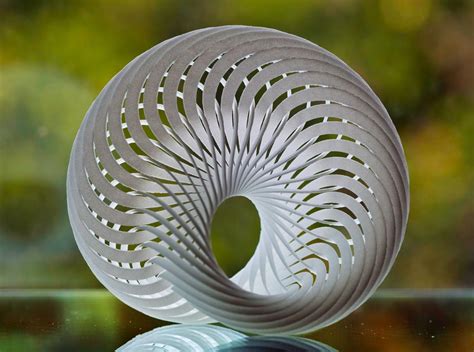 Mobius nautilus, a compound mobius strip made out of 36 interlocking mobius strips : pics