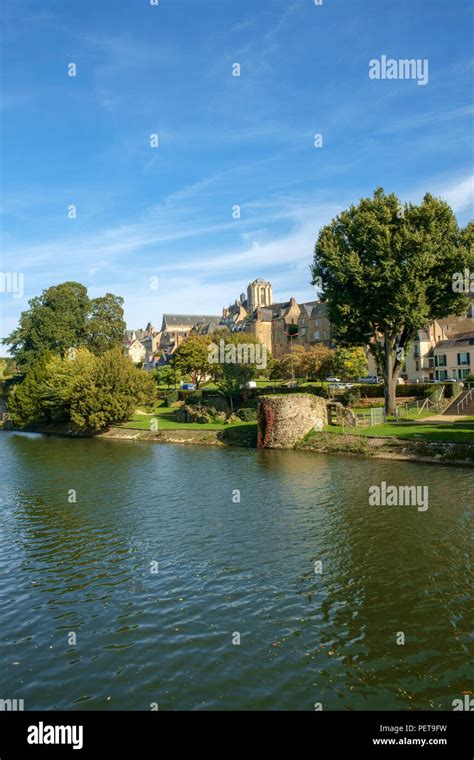 Buildings of old town Le Mans line the River Sarthe in afternoon sun ...