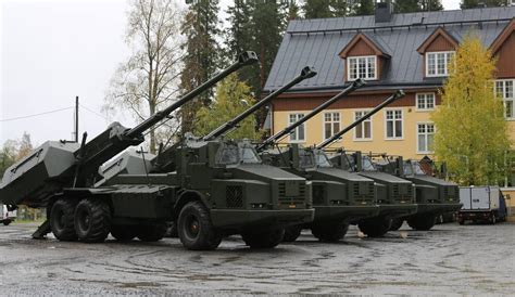 Four Swedish Archer self-propelled howitzers. Nine rounds of 155mm ...