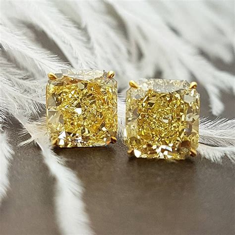 Stunning Fancy Yellow diamond stud earrings for special occasion from #PrimaGems #yellow ...