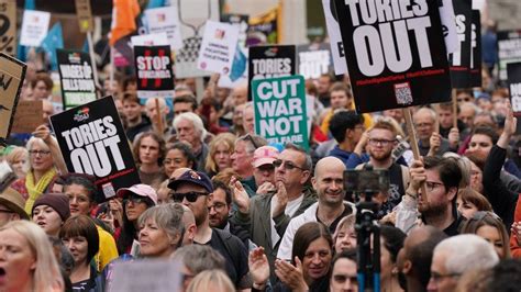 Hundreds protest in Birmingham as Tory conference begins - BBC News