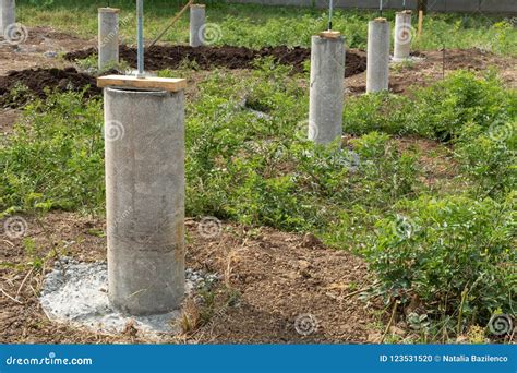 Workers Dig a Pit for a Septic Tank Stock Photo - Image of ...