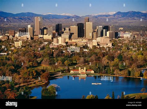 Skyline of Denver, Colorado, USA over the city park lake with the Rocky ...