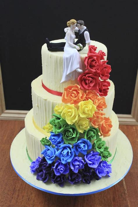 Rainbow rose wedding cake - Decorated Cake by - CakesDecor