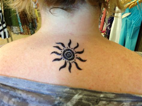 Cute henna sun on the upper back, right below the neck Sun Tattoos ...