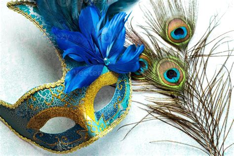 Venetian carnival mask and peacock feathers. Carnival celebration ...