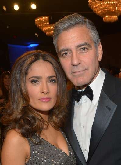 Actress Salma Hayek (L) and actor George Clooney attend the 2013 ...