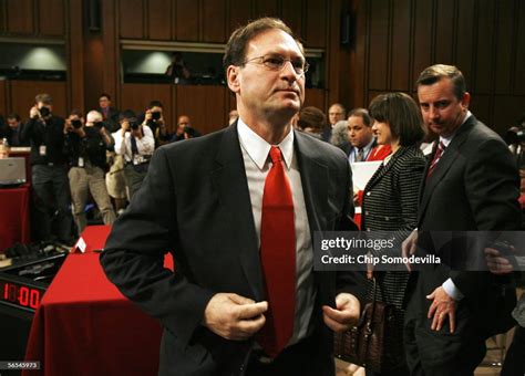 U.S. Supreme Court nominee Judge Samuel Alito leaves the hearing room ...