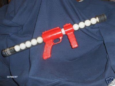 Shooting Burp Gun Toy Shoots Ping Pong Balls | #22578325