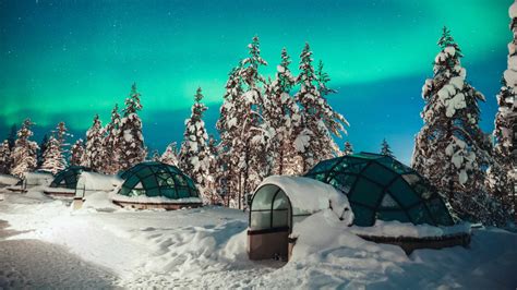 See the Northern Lights from a glass igloo at Kakslauttanen in Finland