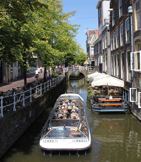 Delft, boat tour through the canals. For decades Rondvaart Delft has ...