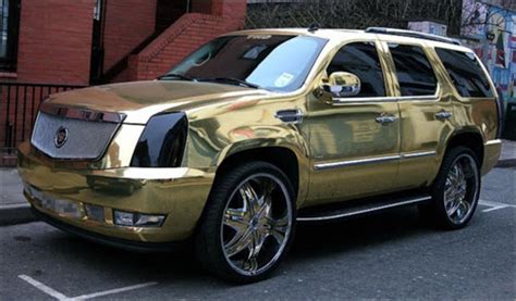 While Our Artistes Are Whining, Check Out KCEE's Gold Plated Cadillac Escalade (Photos)