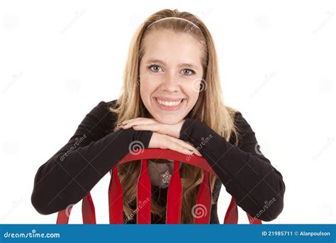 Girl Red Chair Smile Backwards Stock Image - Image: 21985711