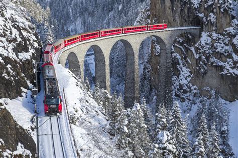 The red train of the Albula-Bernina Express Railway, UNESCO World ...