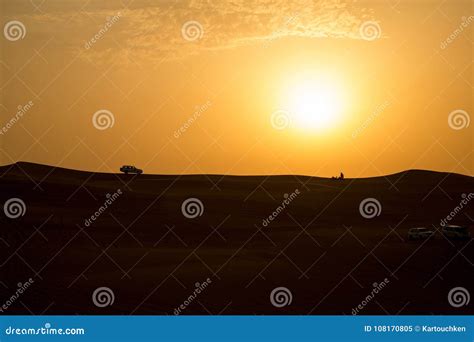 Sunset in dessert of Dubai stock image. Image of orange - 108170805