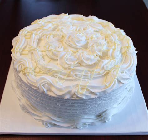 Creative Cakes by Lynn: White on White Wedding Cake (lemon cake with raspberry filling and white ...