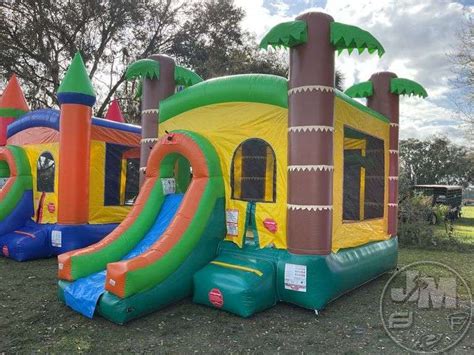 INFLATABLE BOUNCE HOUSE WITH BLOWER - Jeff Martin Auctioneers, Inc.