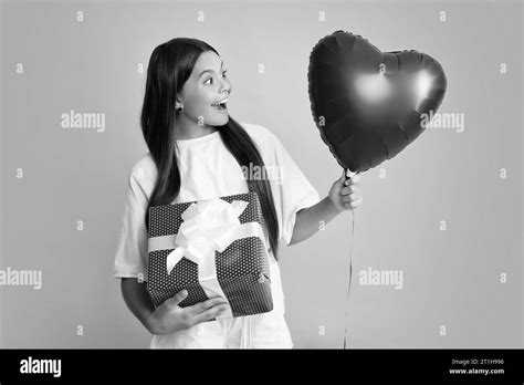 Teenager red balloon Black and White Stock Photos & Images - Alamy