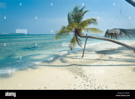 Beach scene luxury resort Maldives Stock Photo - Alamy