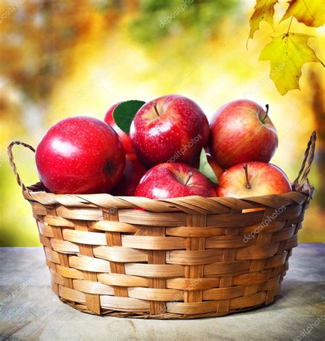 Fresh apples in basket Stock Photo by ©Melpomene 41340553