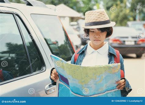 Young Woman Traveler Hand Hold and Look Map Stock Photo - Image of street, hold: 124620982