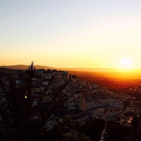 Premium Photo | Aerial view of cityscape at sunset