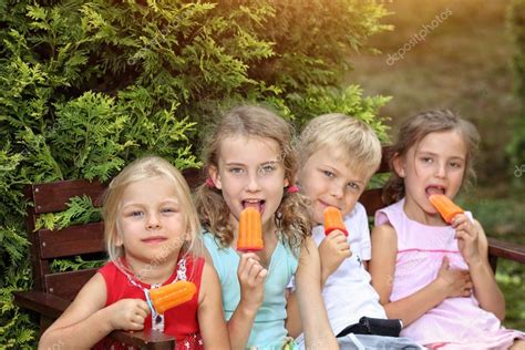 Friends eating ice cream Stock Photo by ©ambrozinio 117944430